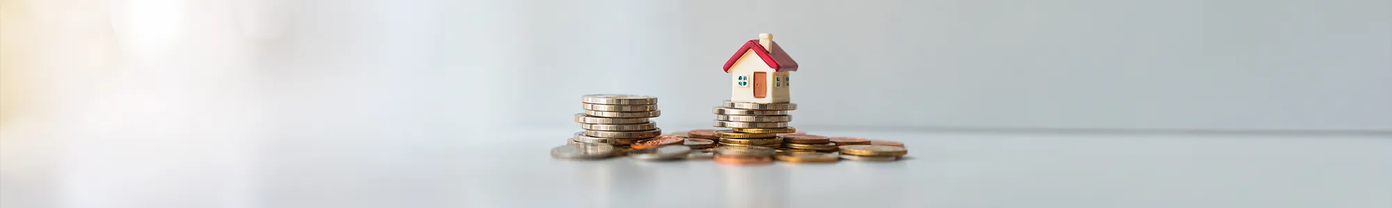 extra coins above a small house