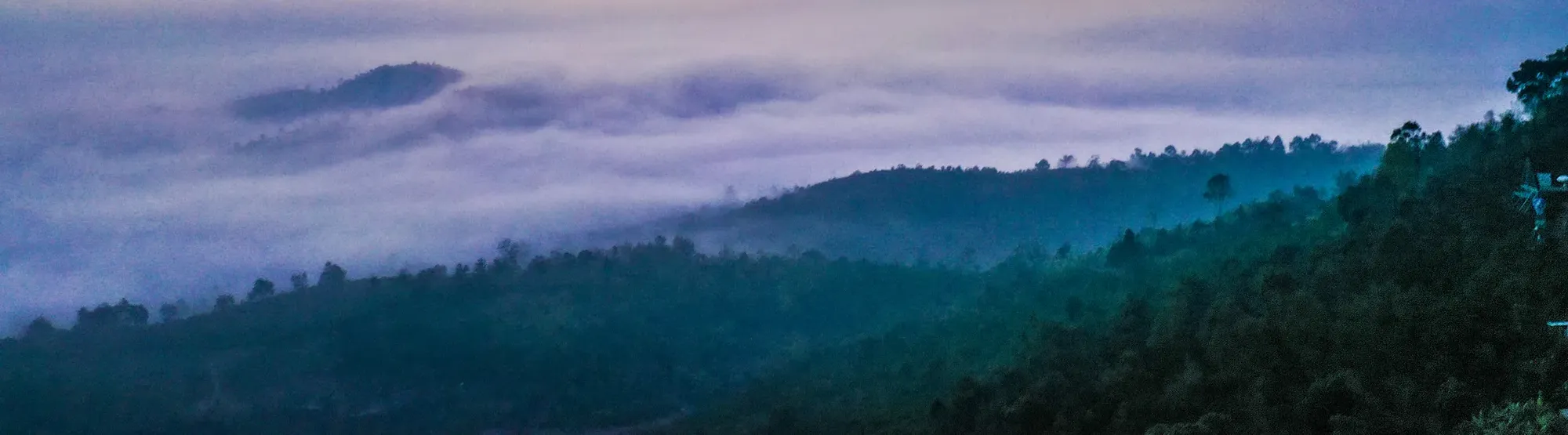 Mountain with cloudy skies
