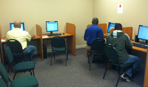 Clients use the newly installed computer  learning lab at River Edge’s Emery Highway  location. A Health IT grant from SAMHSA funded the lab at Emery, River Edge’s other outpatient  locations and sites at View Point Health.